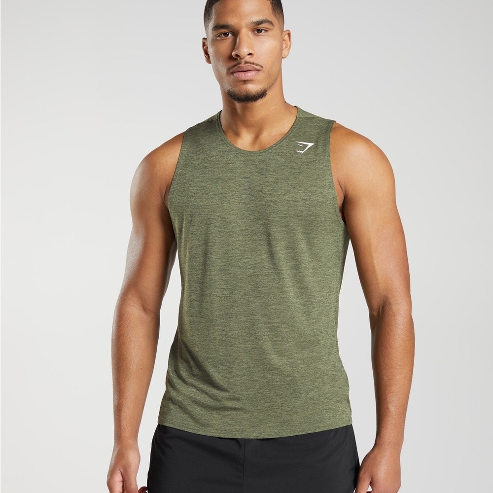 Gymshark ARRIVAL SLIM MARL TANK
Slim Fit Core Olive/Kalamata Olive Marl MEN